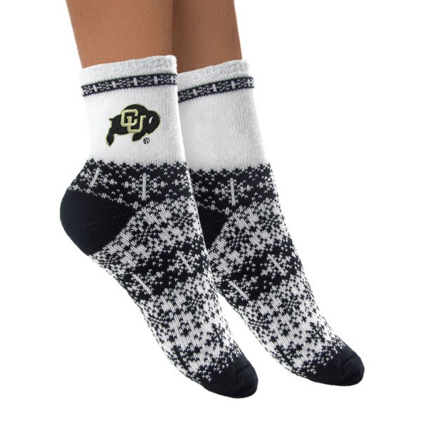 A pair of black and white festive patterned crew socks with CU Buffalo logo embroidered on side.